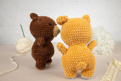 a couple of stuffed animals sitting next to each other