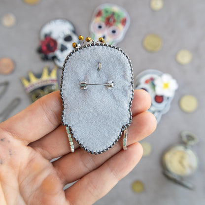 a person holding a piece of fabric with a clock on it