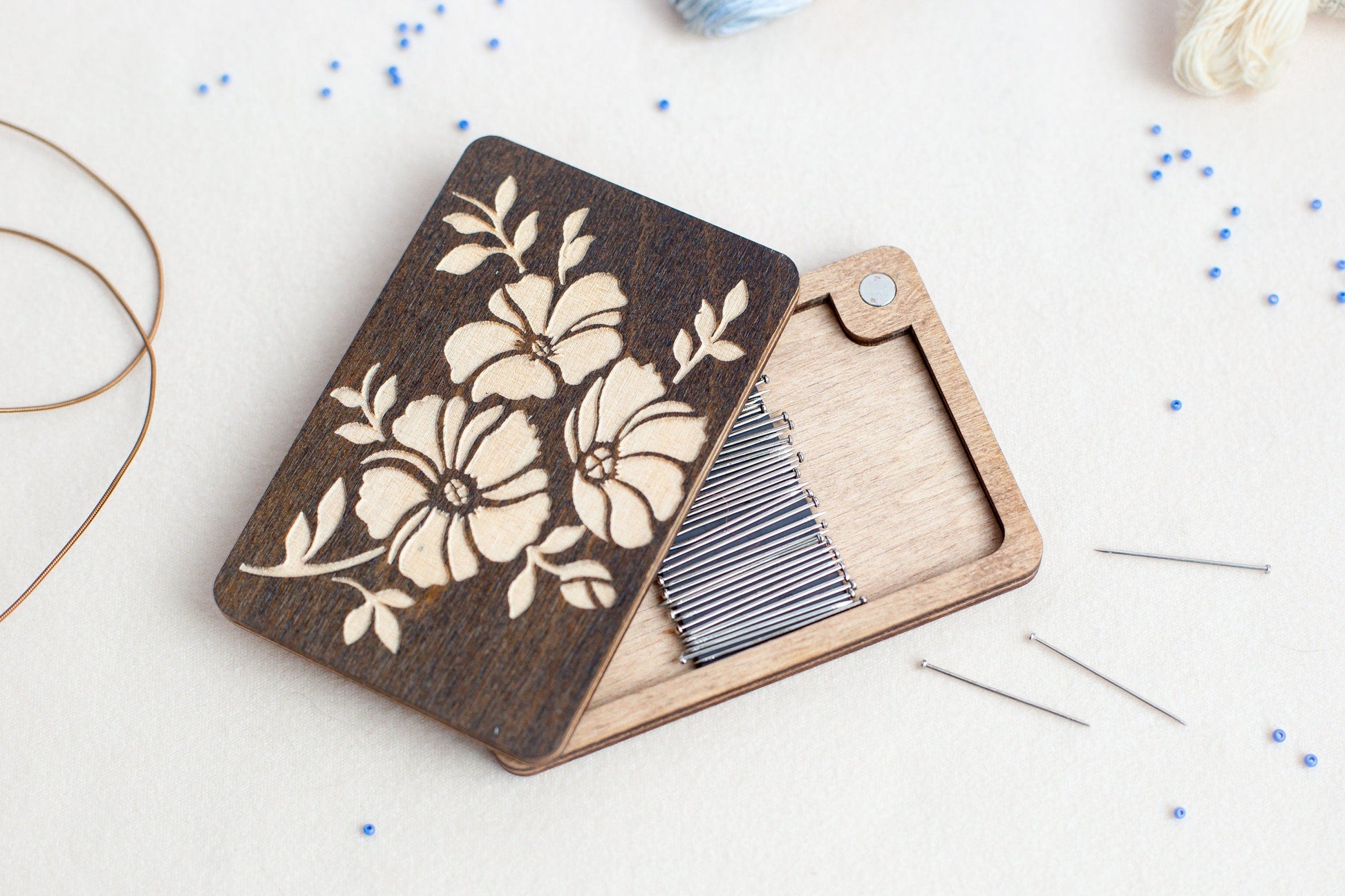 a piece of wood with a flower design on it