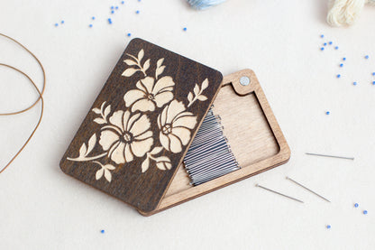 a piece of wood with a flower design on it