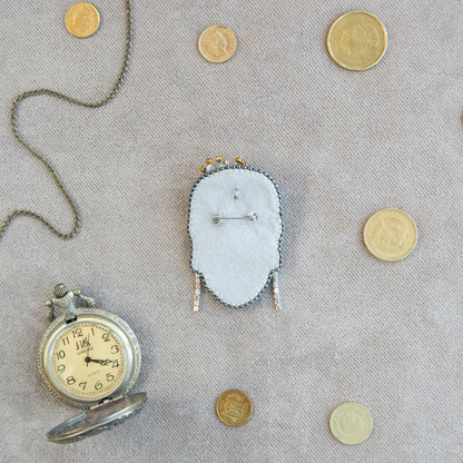 a clock and some coins on a table