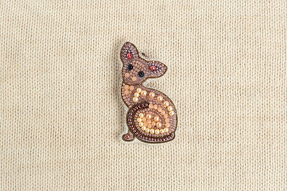 a picture of a small animal made out of beads