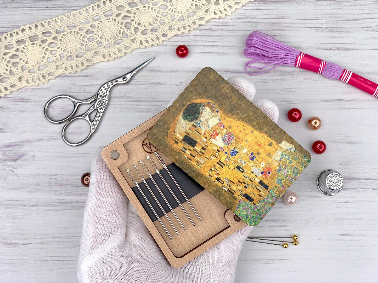 a person holding a card with a picture of a woman on it