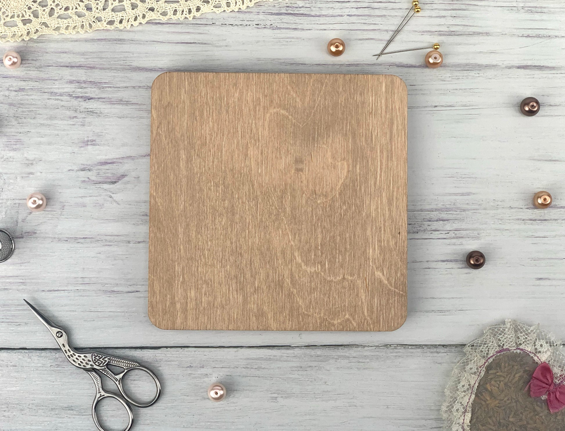 a wooden cutting board sitting on top of a table