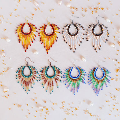 a set of four pairs of beaded earrings