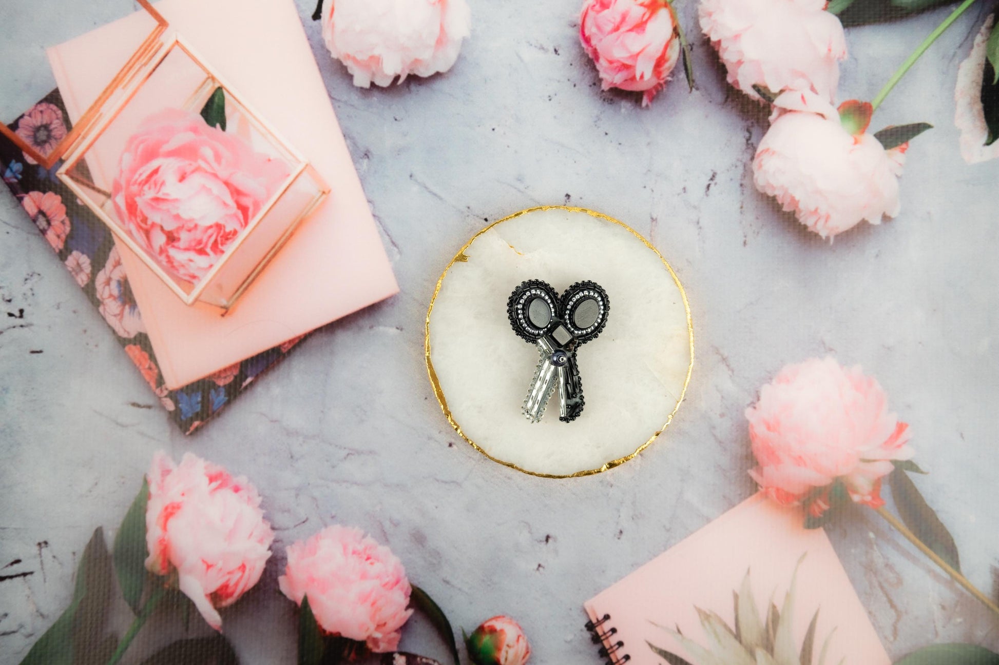 a cupcake with a pair of scissors on top of it