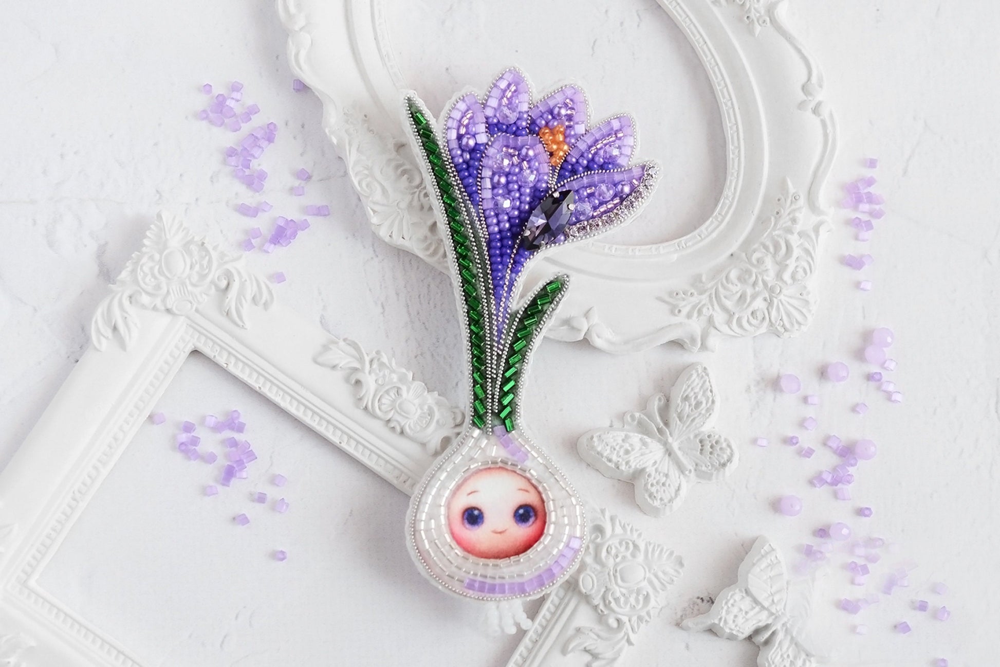 a picture frame with a purple flower in it