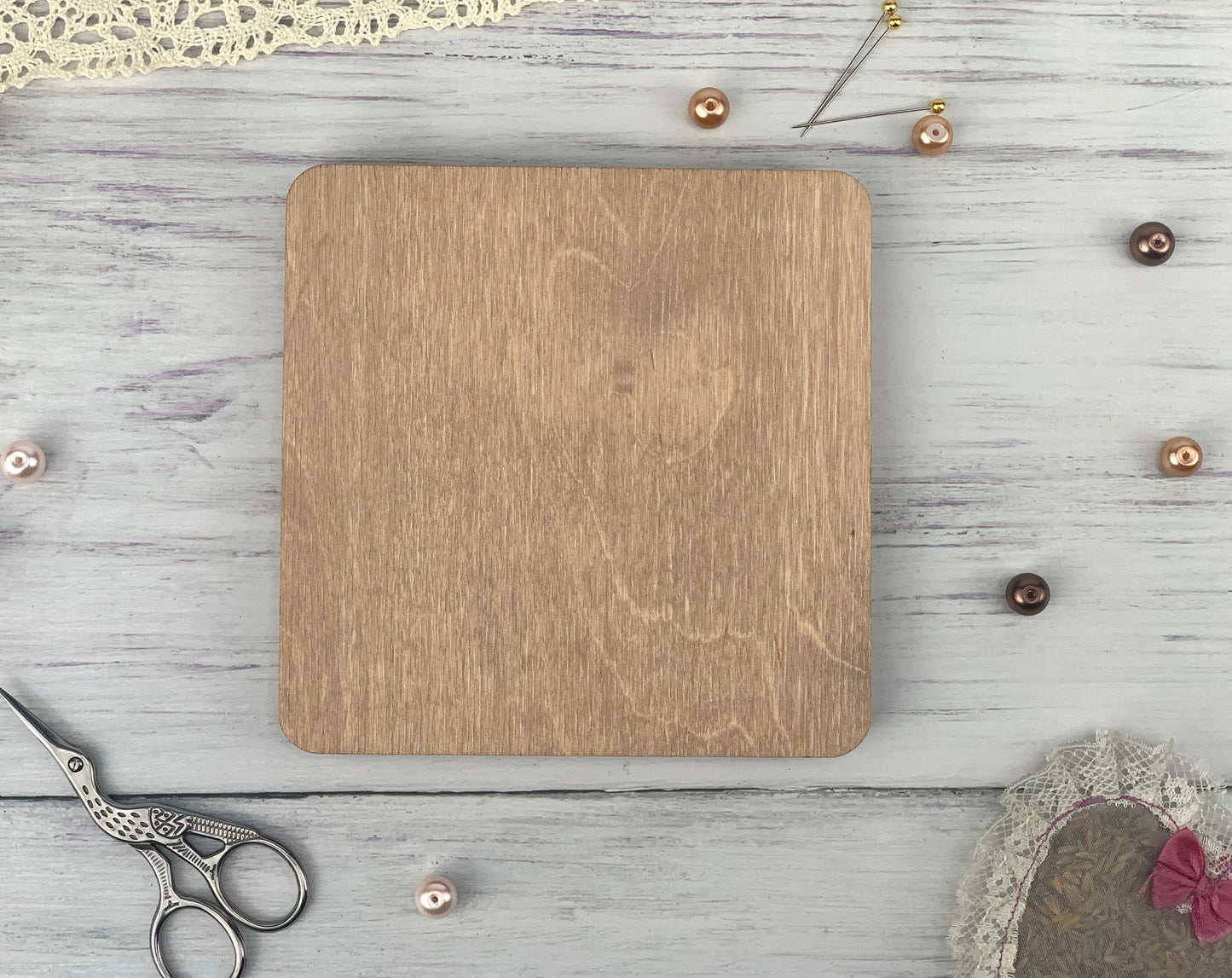 a wooden cutting board sitting on top of a table