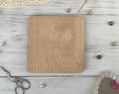 a wooden cutting board sitting on top of a table