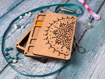 a wooden case with a flower design on it