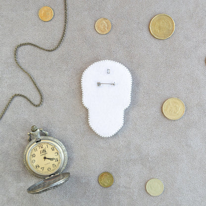 a clock and some coins on a table