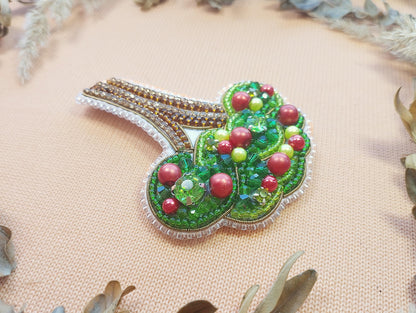 a brooch that is sitting on a table
