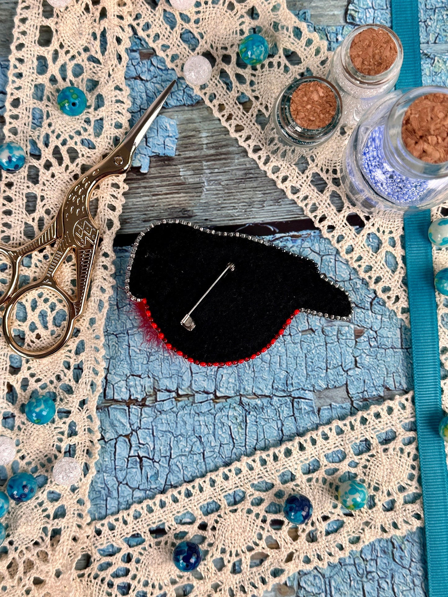 a close up of a piece of cloth with scissors