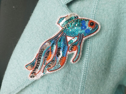 a close up of a person wearing a blue shirt