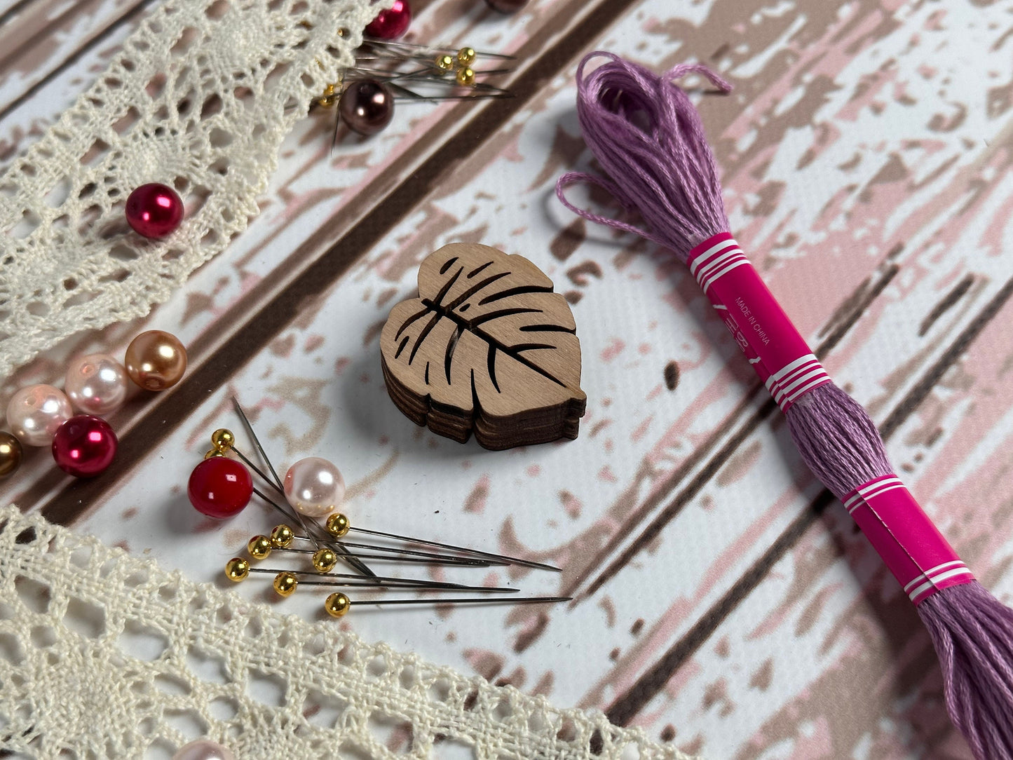 a table topped with lots of crafting supplies