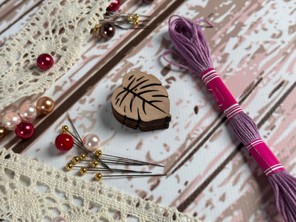 a table topped with lots of crafting supplies