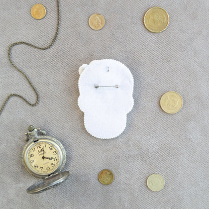 a clock and some coins on a table