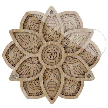 a wooden carving of a flower on a white background