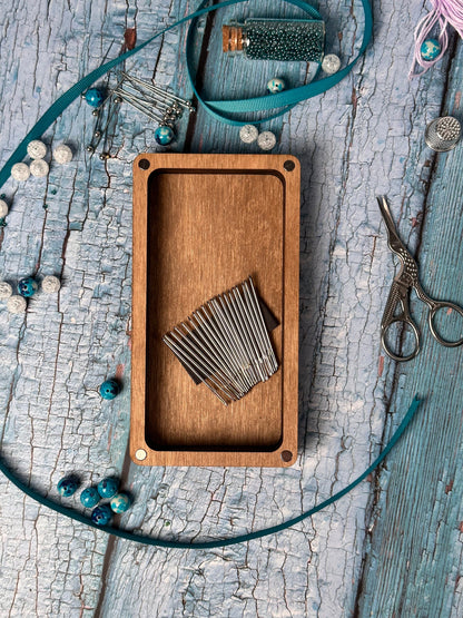 a wooden box with a piece of fabric on top of it