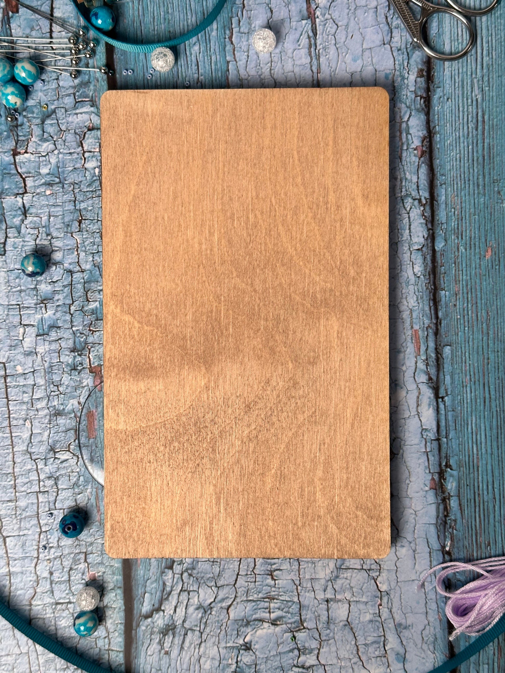 a wooden cutting board sitting on top of a table