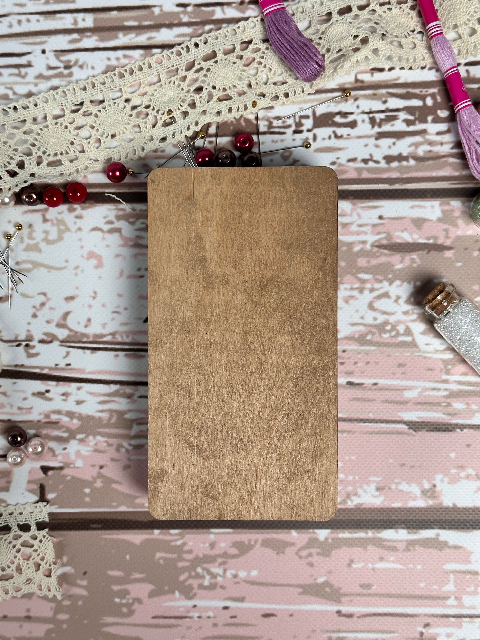 a wooden cutting board sitting on top of a table