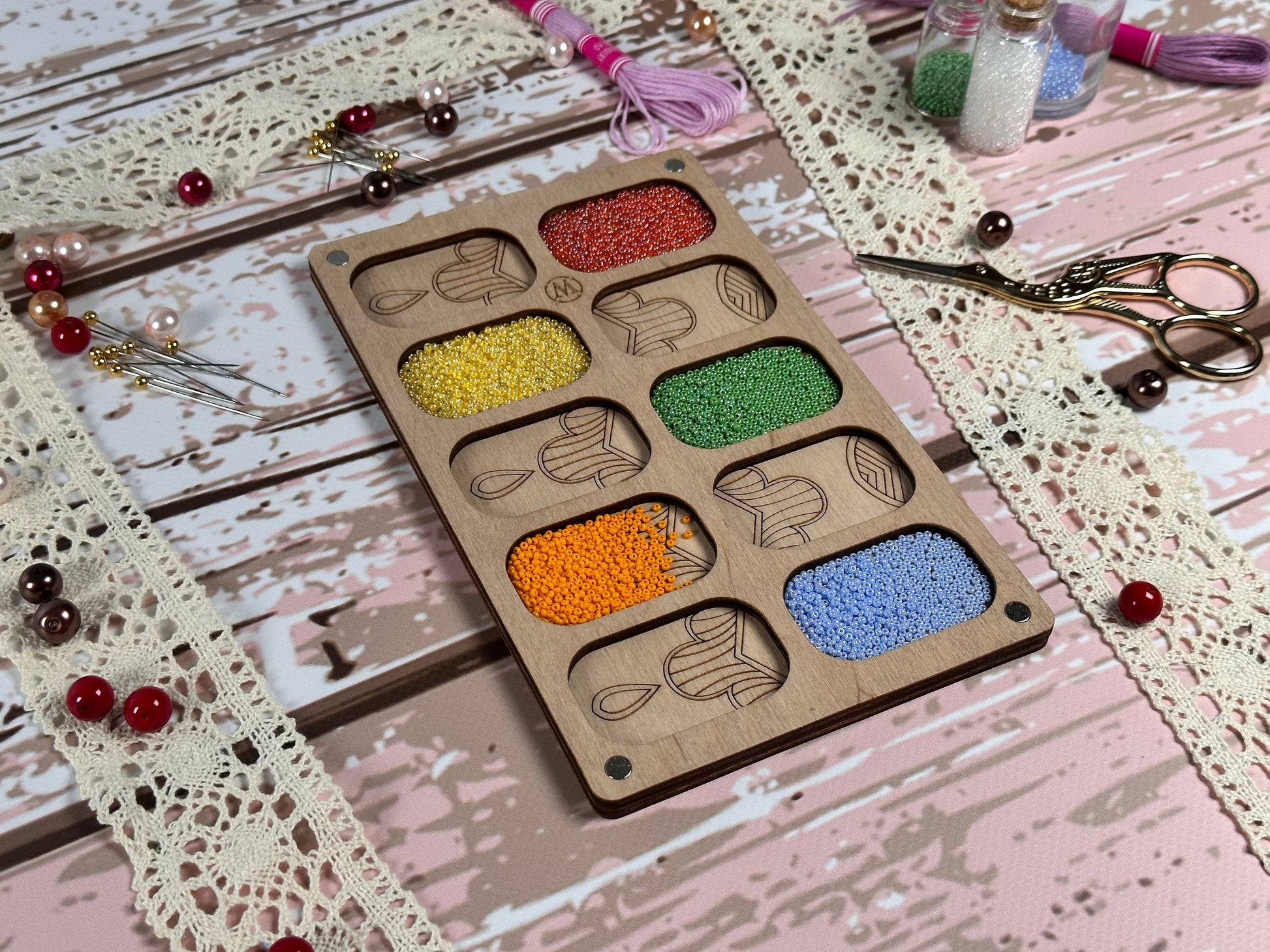 a cupcake pan filled with different colored cupcakes