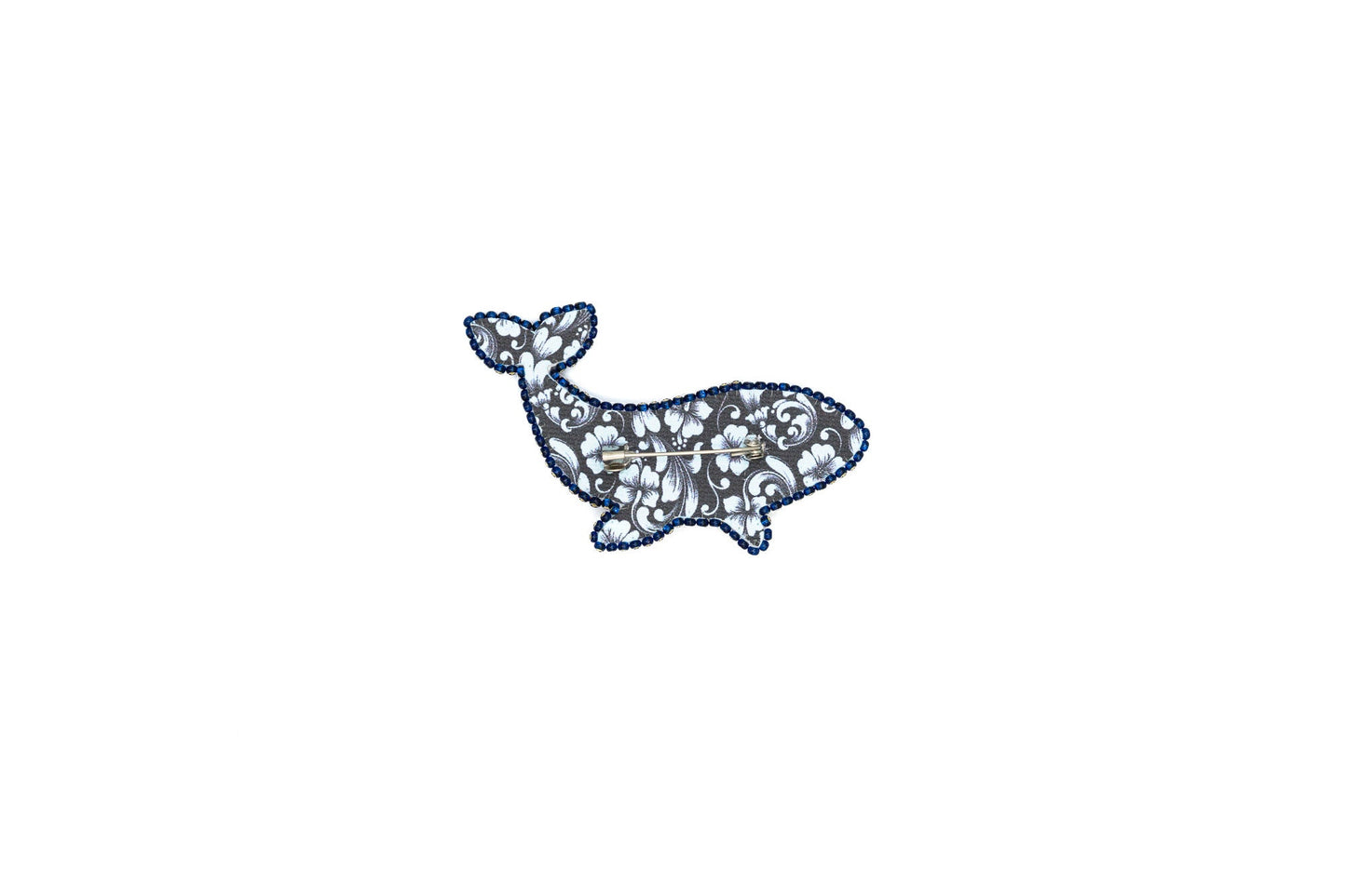 a picture of a whale made out of shells