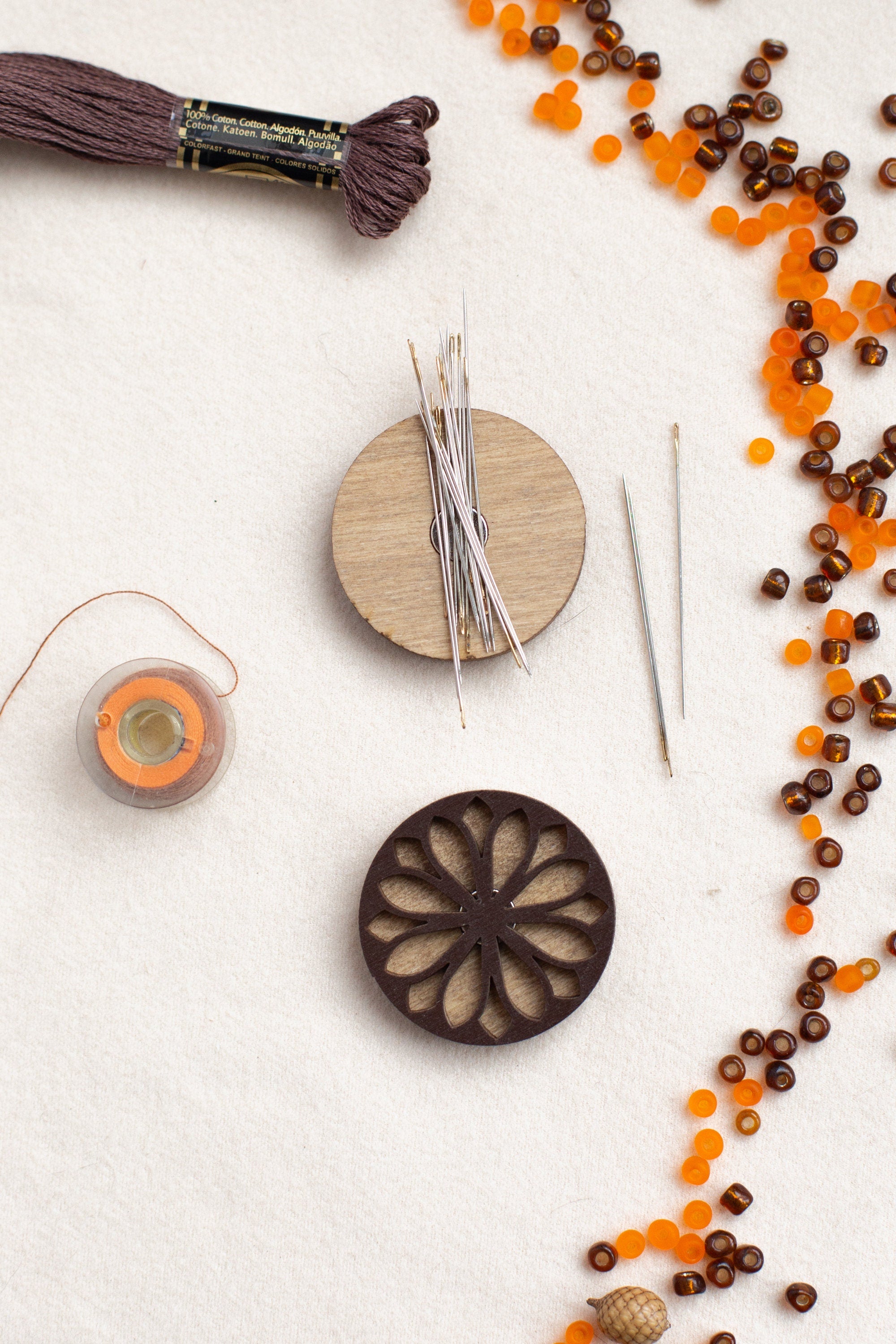 a table topped with different types of crafting supplies