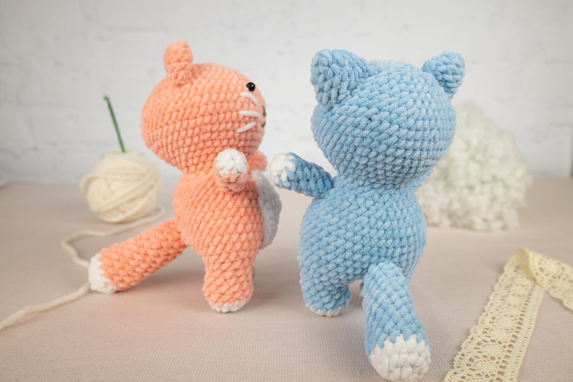 a couple of stuffed animals sitting next to each other