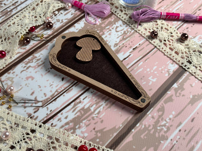 a piece of wood with a heart cut out of it