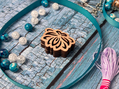 a close up of a wooden object on a table