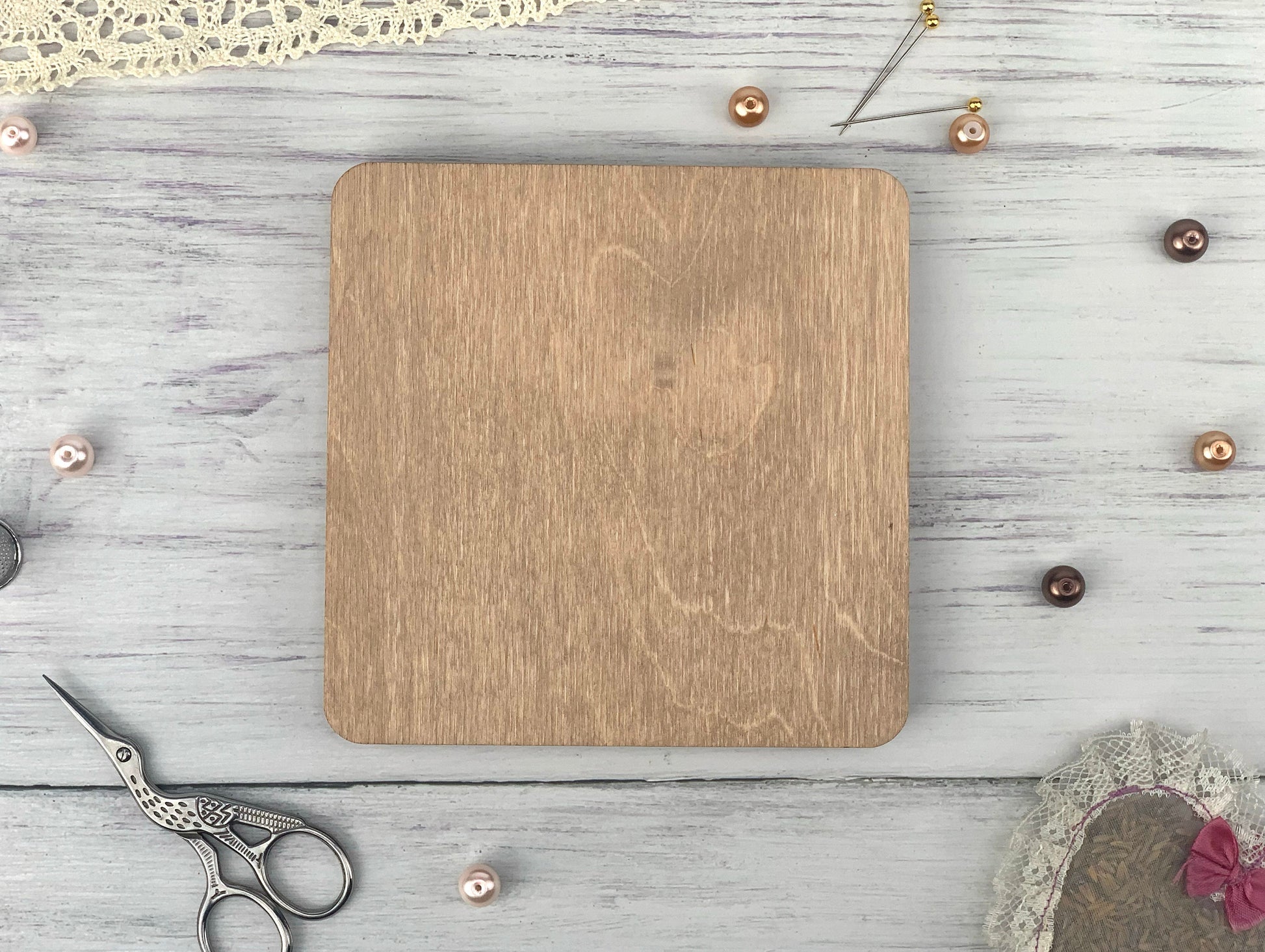 a wooden cutting board sitting on top of a table