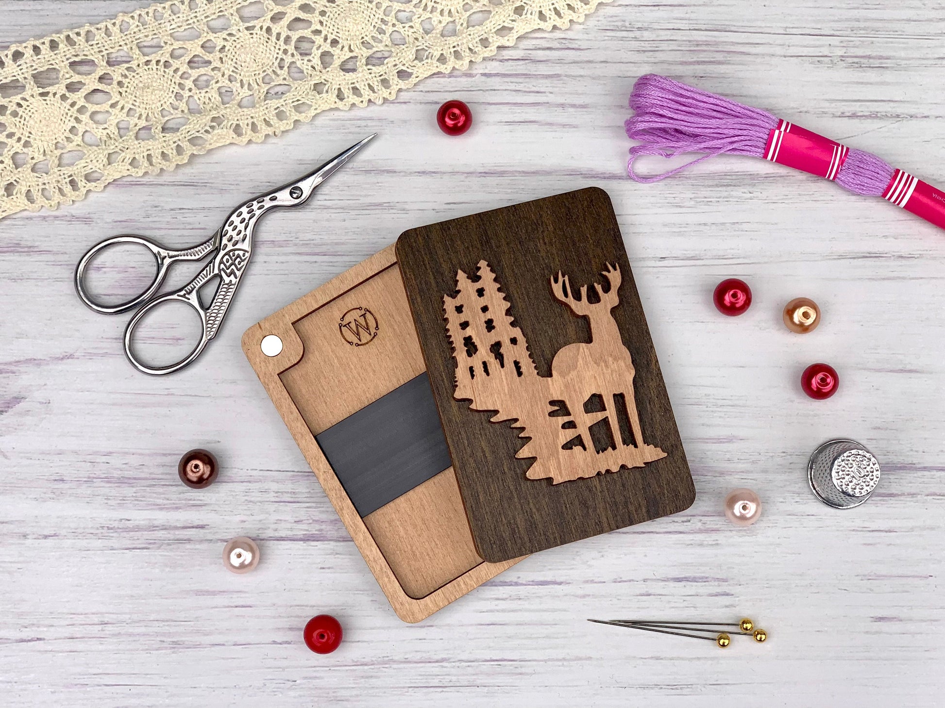 a wooden cutting board with a picture of a deer