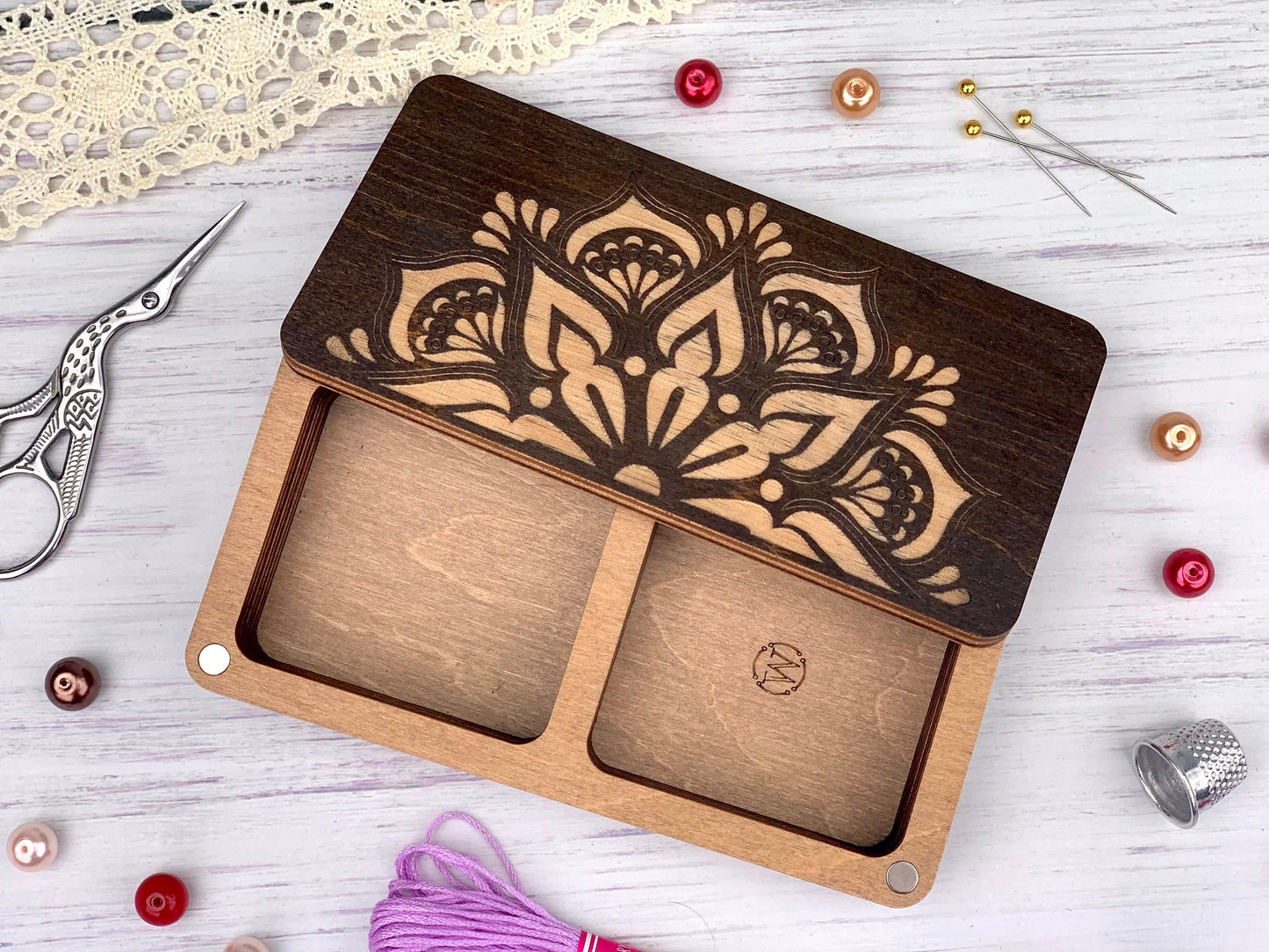 a wooden box with a cut out of it