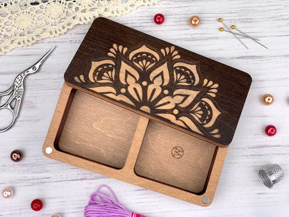 a wooden box with a cut out of it