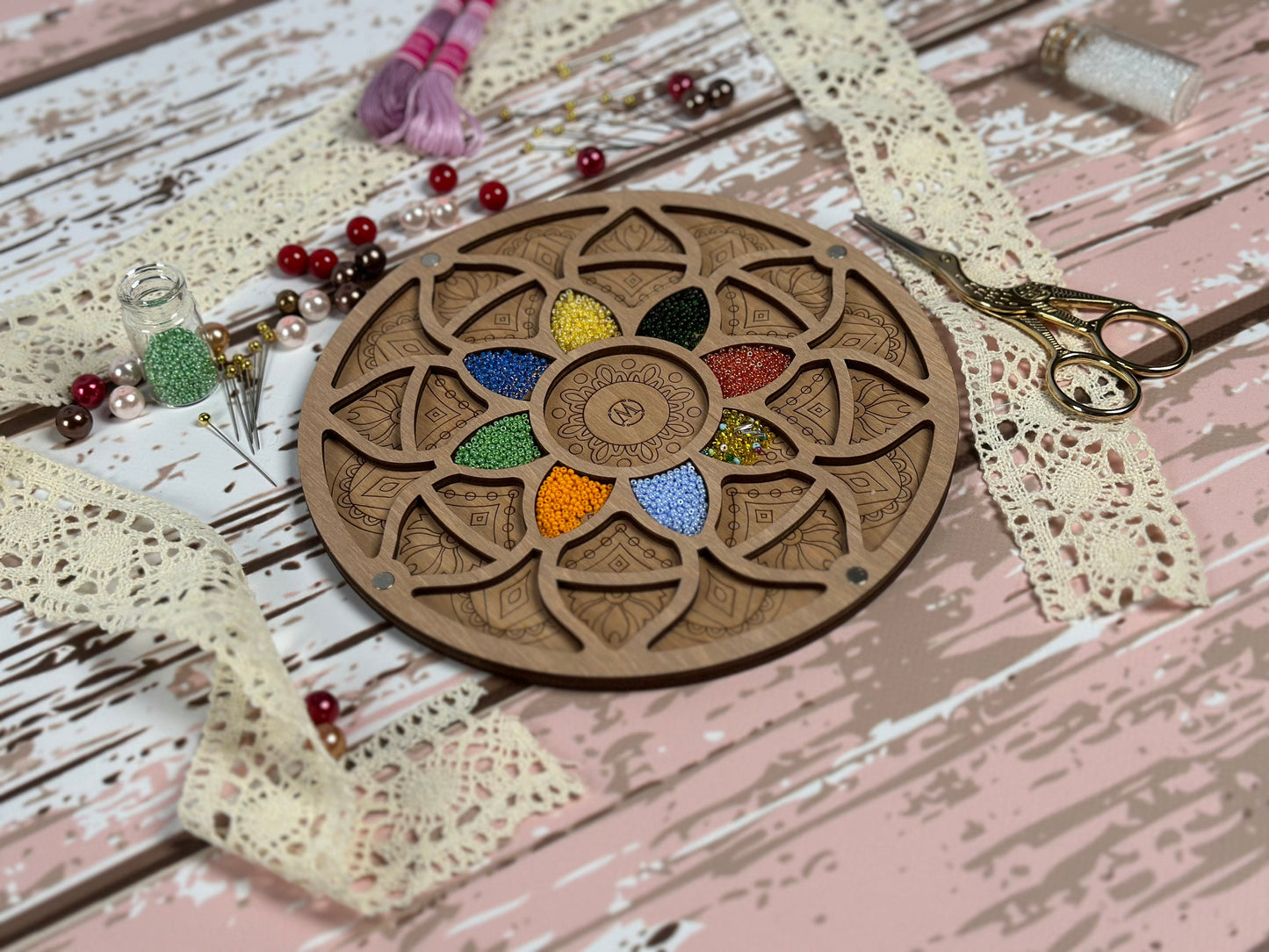 a wooden plate with a flower design on it