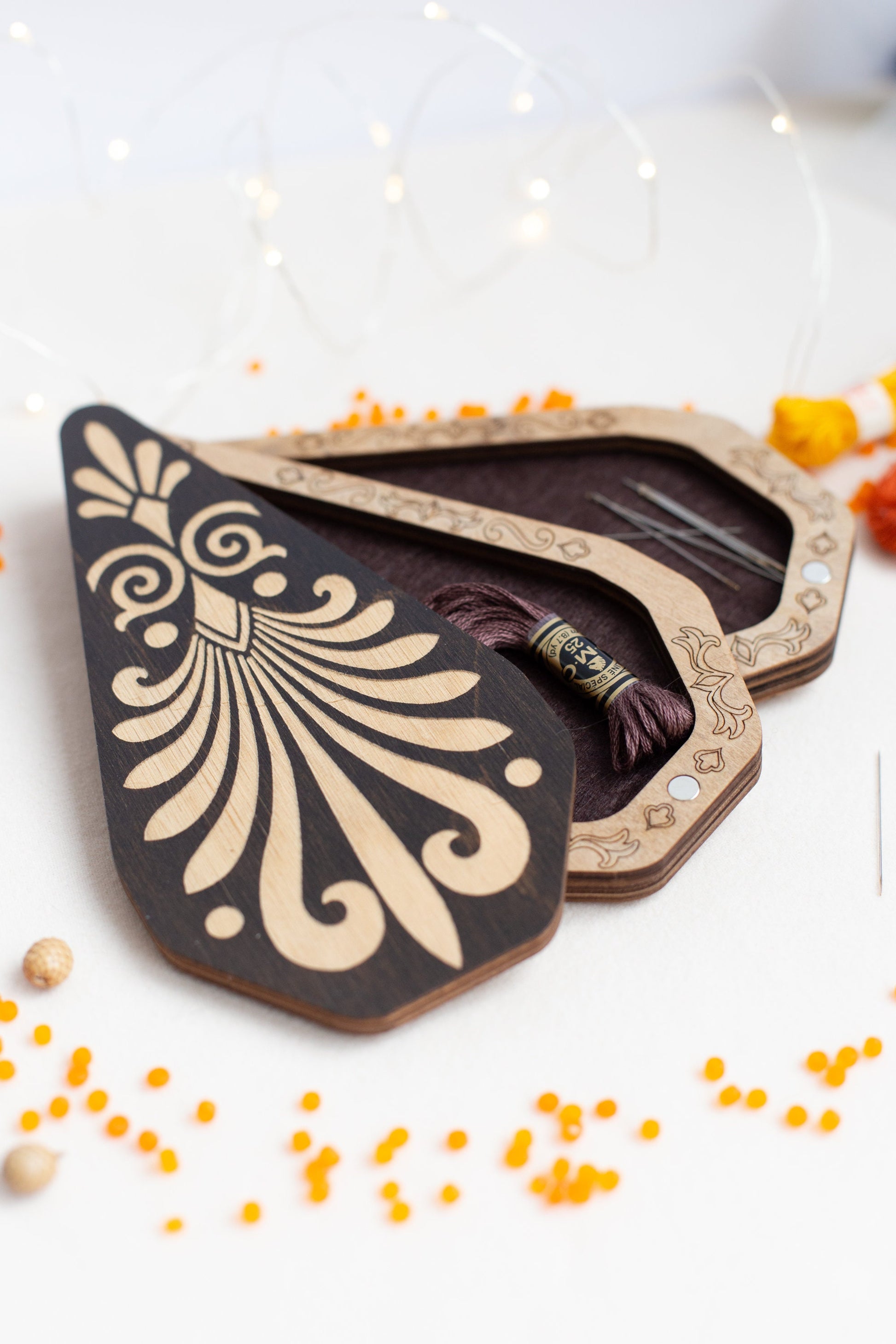 a couple of wooden tags sitting on top of a table