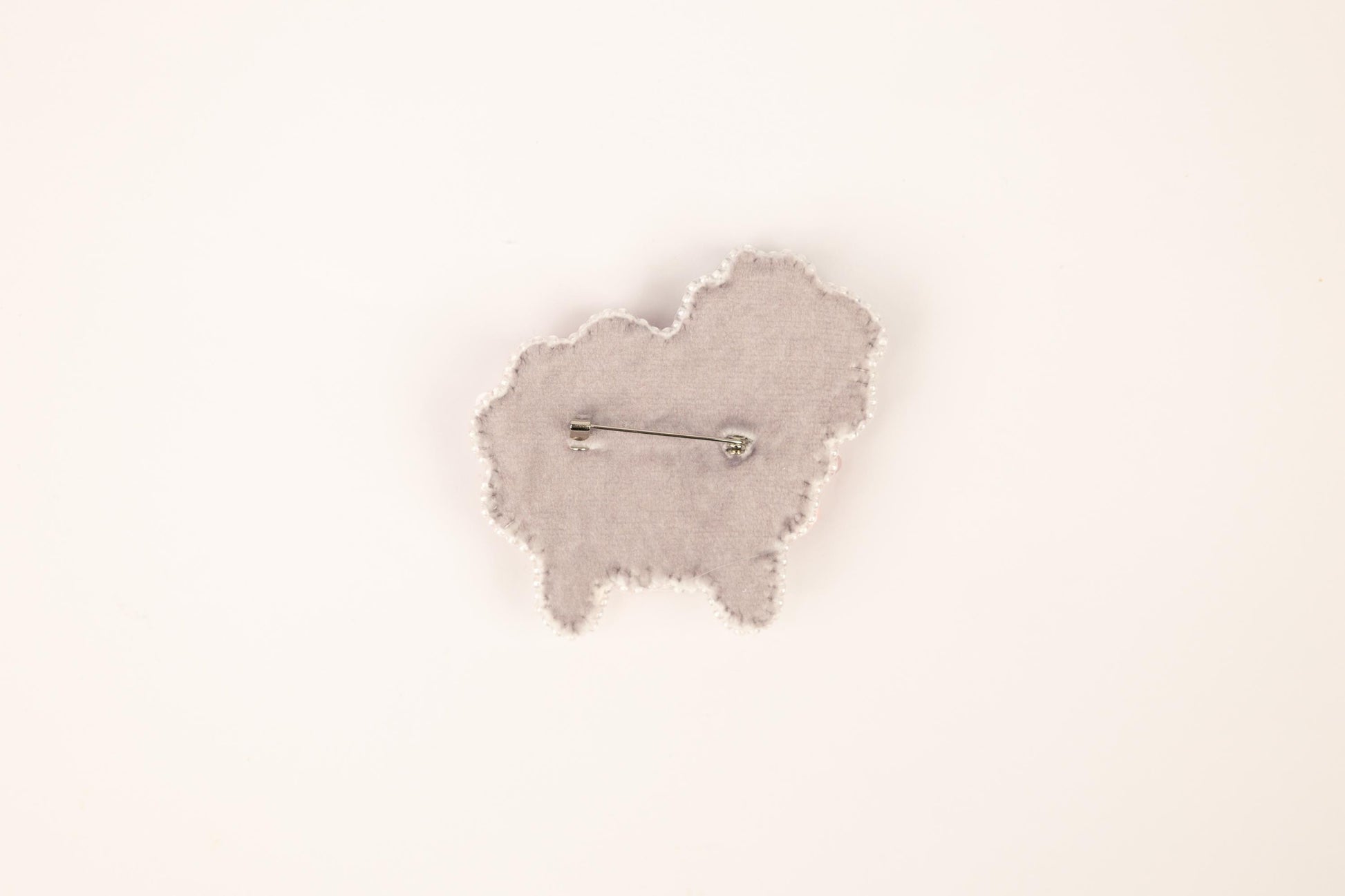 a white wall with a clock on it