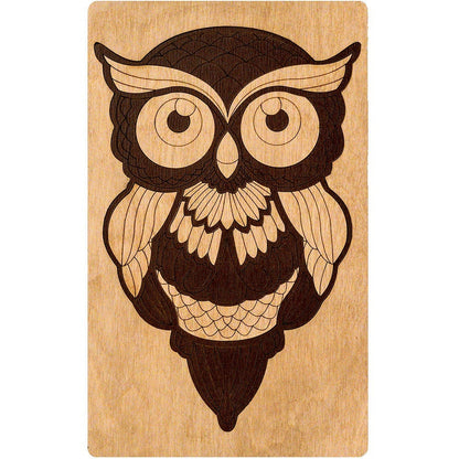 an owl with a big smile on its face