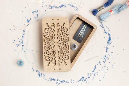 a wooden box with a piece of wood cut out of it