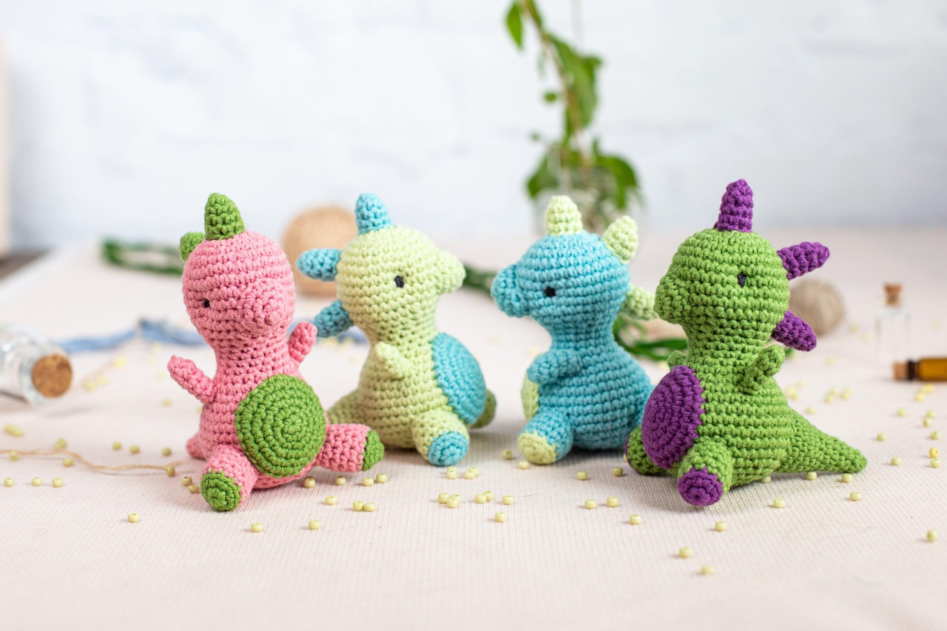 a group of crocheted animals sitting on top of a table