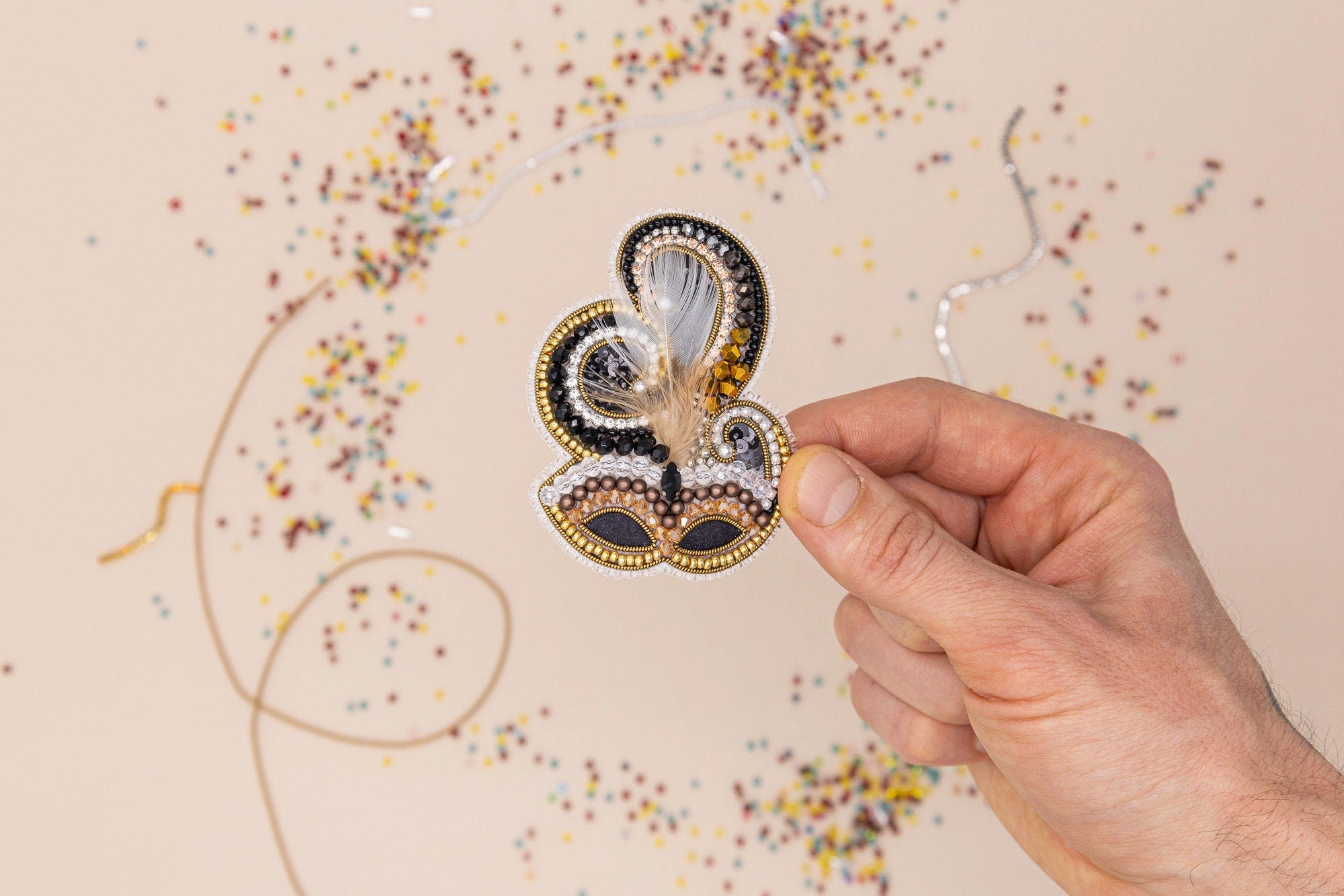 a picture of a snake made out of beads