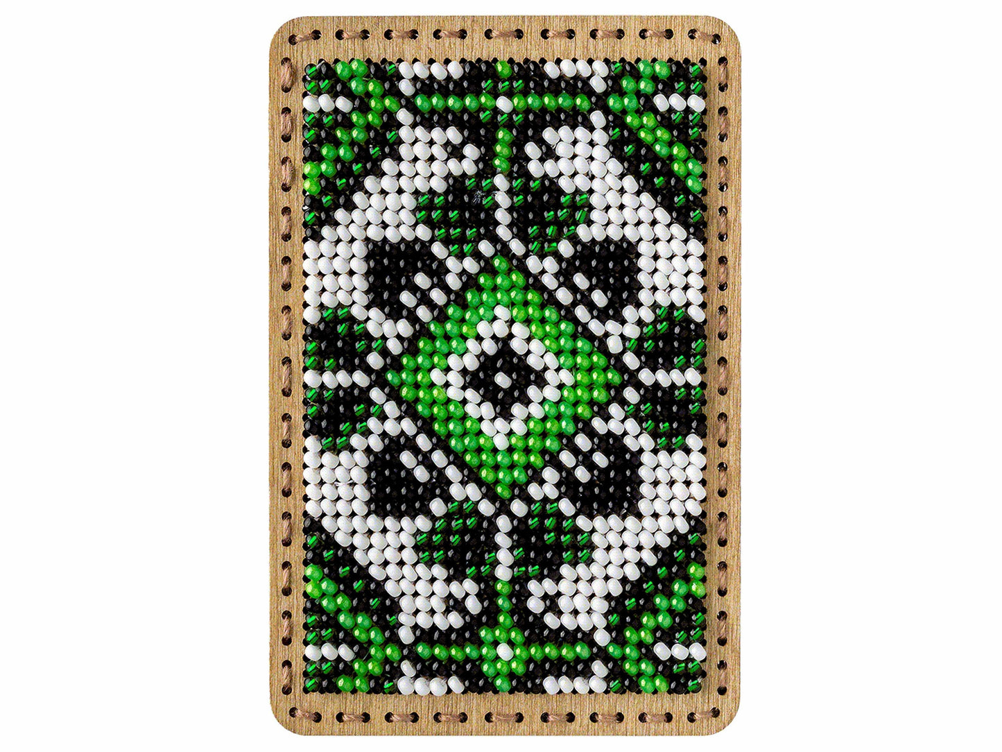 a cross stitch picture of a green and white flower