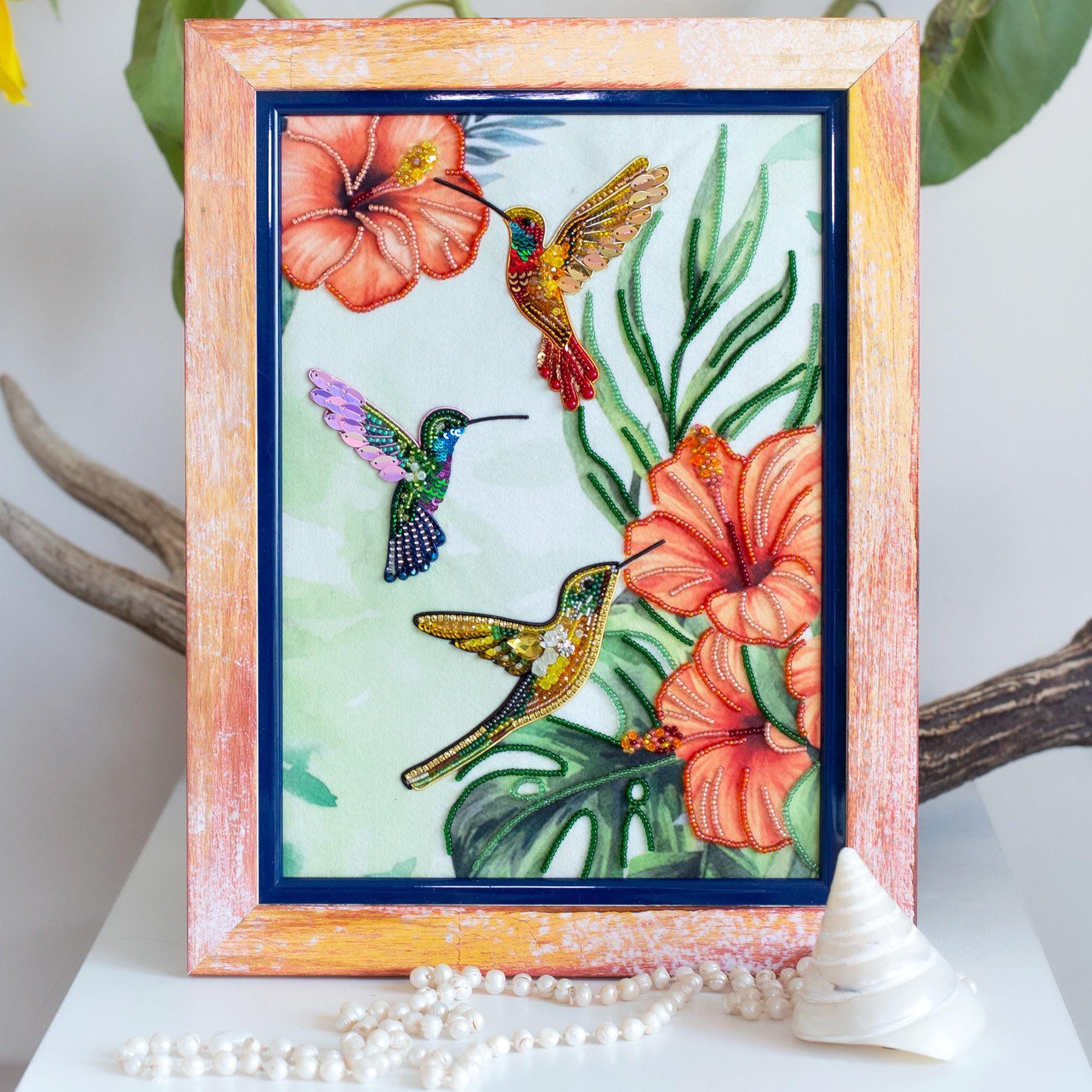 a painting of a hummingbird and a flower