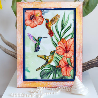 a painting of a hummingbird and a flower