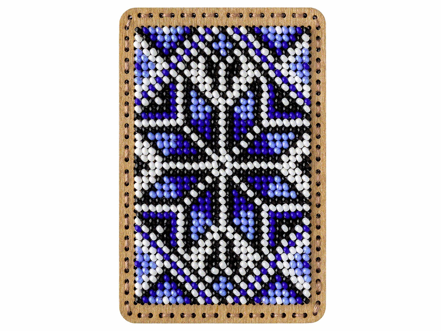 a beaded picture of a cross on a white background