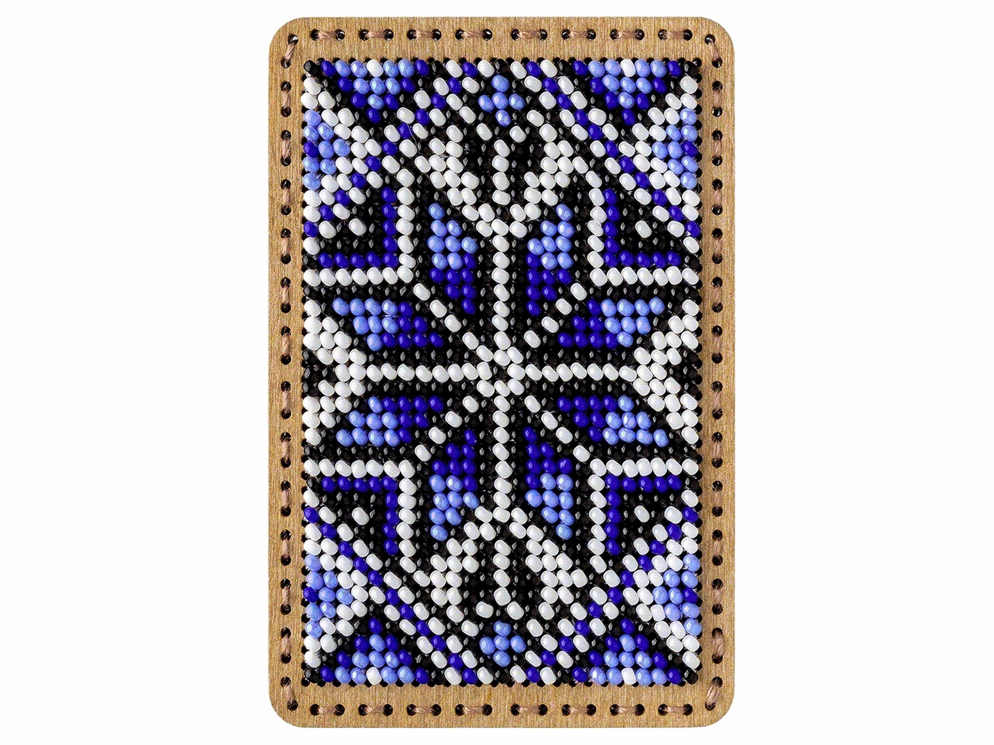 a beaded picture of a cross on a white background