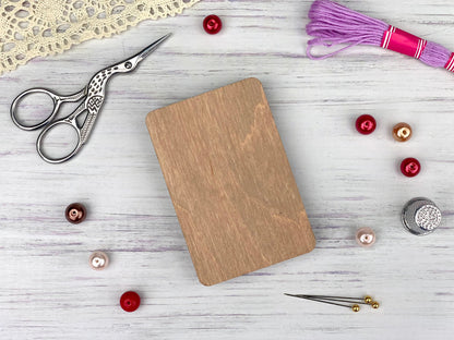 a wooden cutting board sitting on top of a table