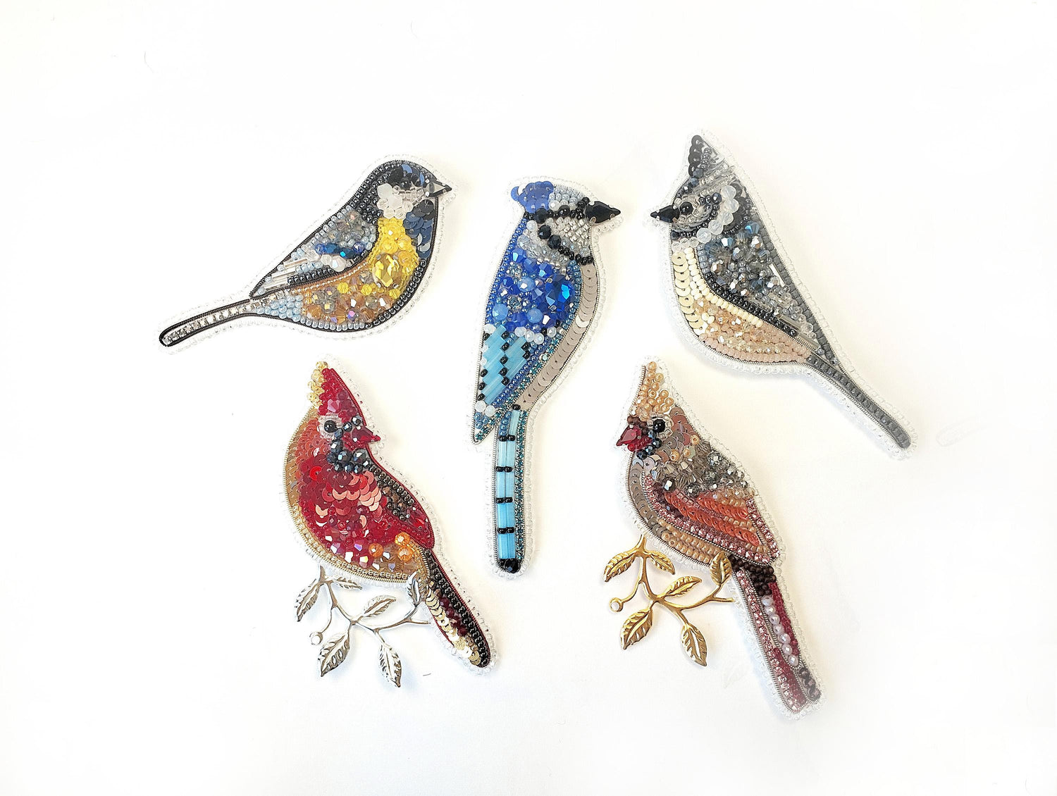 a group of birds sitting on top of each other