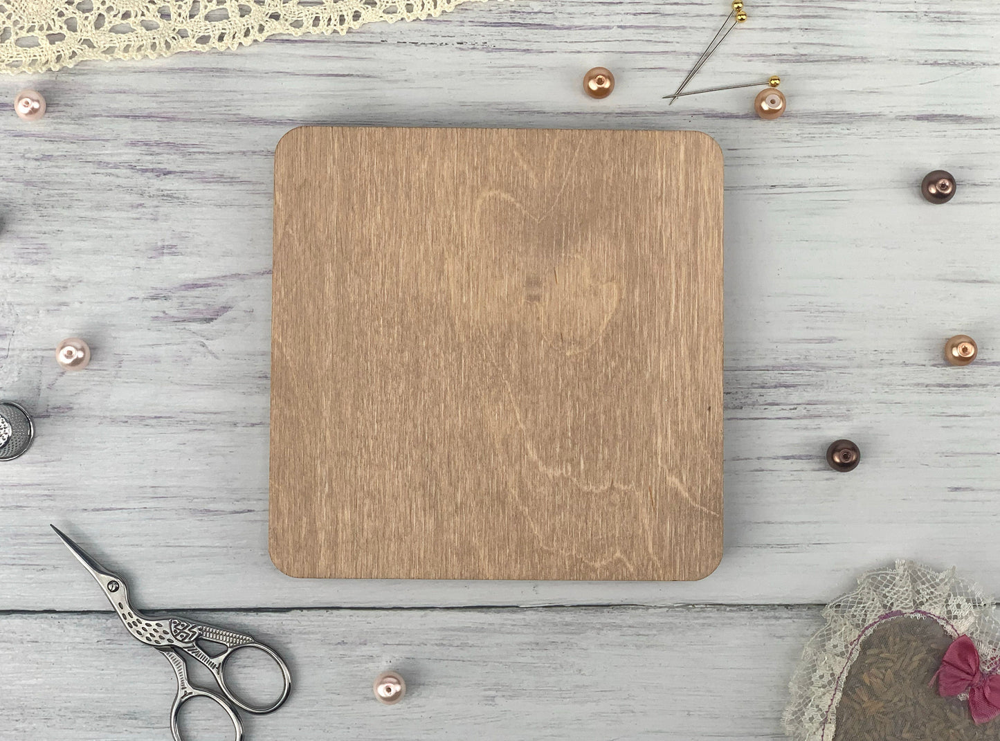 a wooden cutting board sitting on top of a table